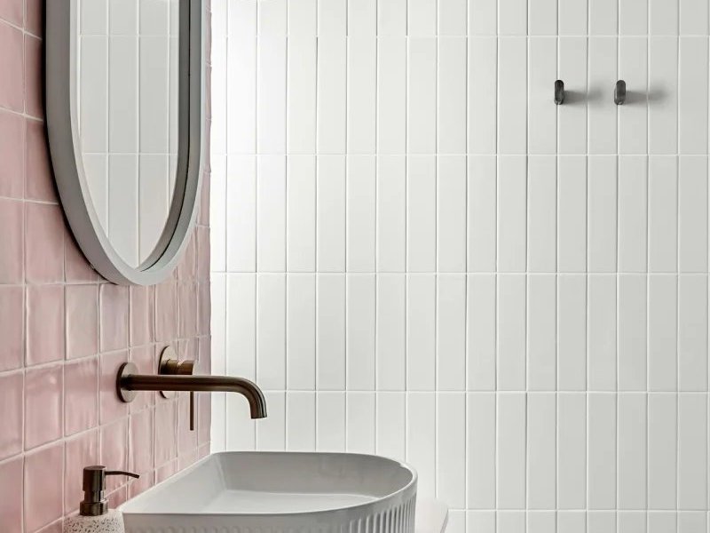 Pink and white tile walls in a stylish bathroom in La Grange, KY